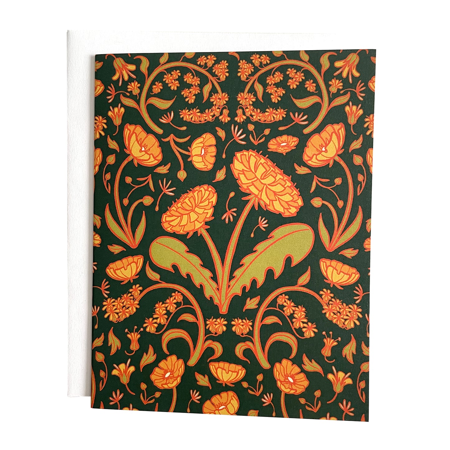 A dark green card is covered in a floral pattern of dandelions, buttercups and goldenrod. The card is on a white envelope on a white background.