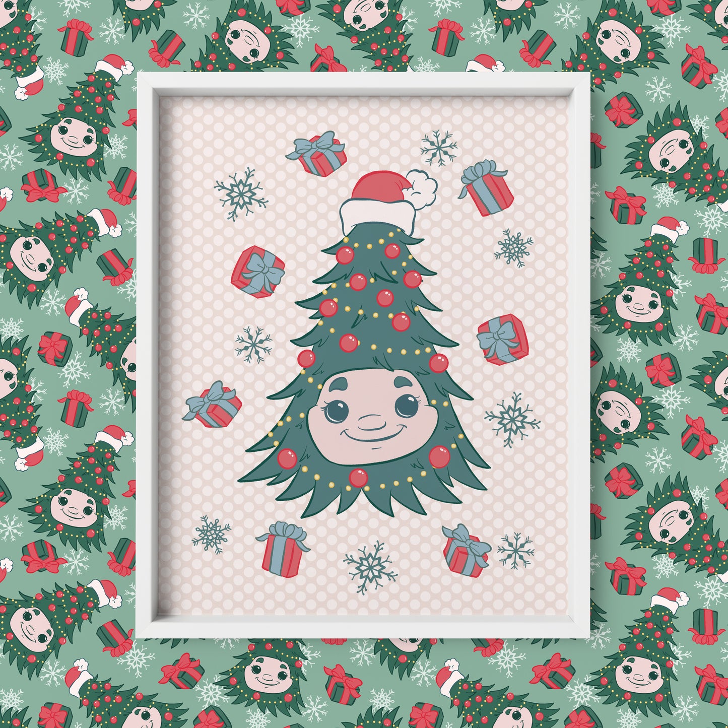 A Christmas tree festooned with red ornaments has a kind face at its centre and is surrounded by red gift boxes, all on a pink polka dot background. The print is in a white frame on background patterned with the tree, gift boxes, and snowflakes.