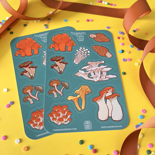 Two teal sticker sheets with a variety of mushroom stickers are on a yellow background with confetti and ribbon.