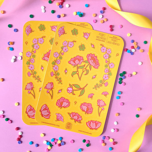 Two yellow sticker sheets featuring pink peony and pink hollyhock stickers are on a pink background with confetti and ribbon.