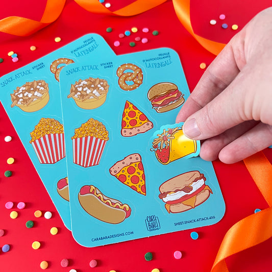 A hand peels a taco sticker from a food-themed sticker sheet.