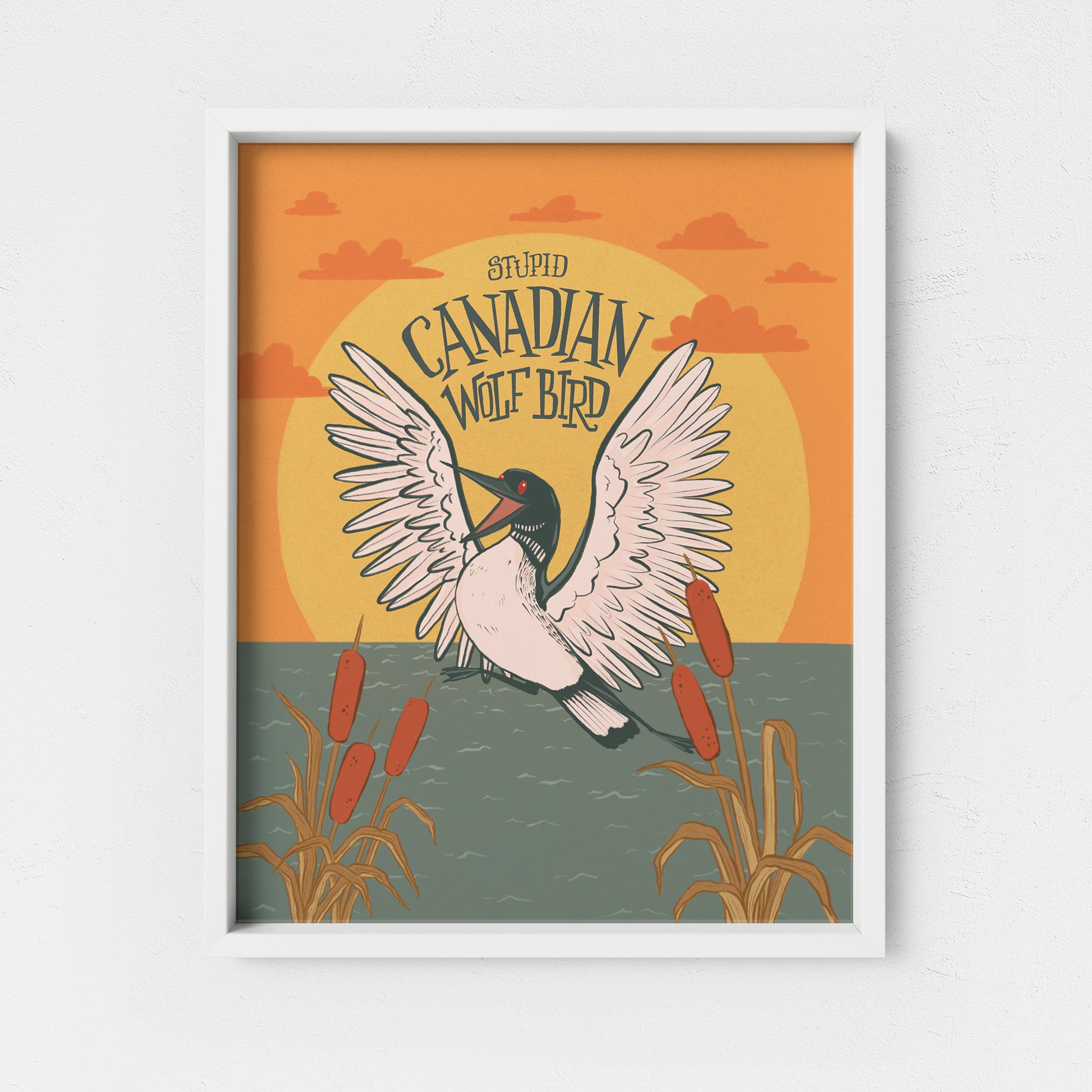 An art print shows a flying, calling loon at sunset with cattails and the words 'stupid Canadian wolf bird' in hand lettering.